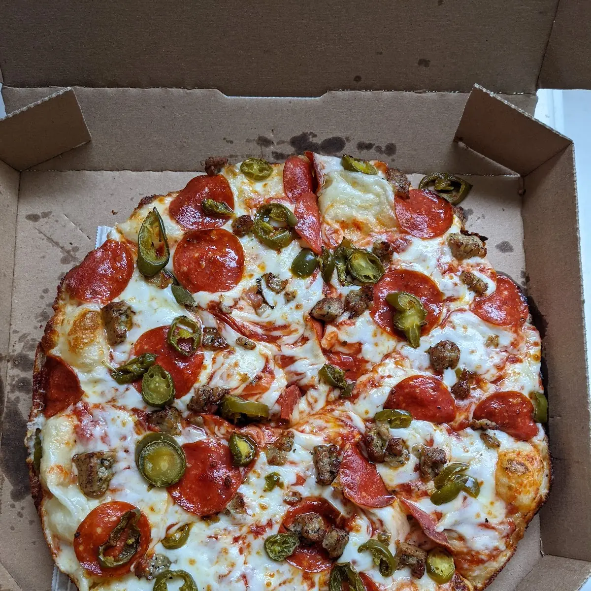 Handmade Pan Pizza with Pepperoni Sausage & Jalapenos