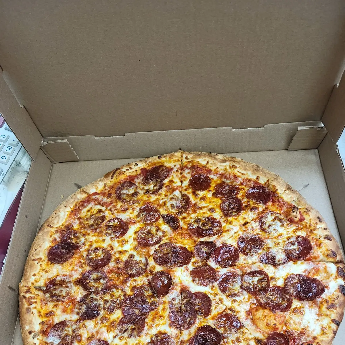 Pepperoni and Mozzarella Cheese Pizza Slices