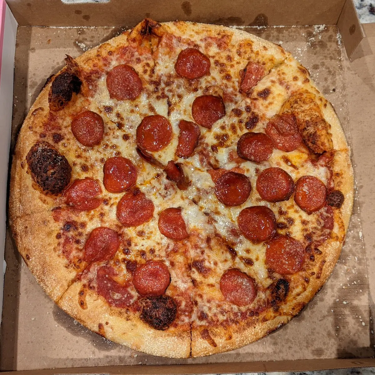 Large Pepperoni Pizza Poorly Made