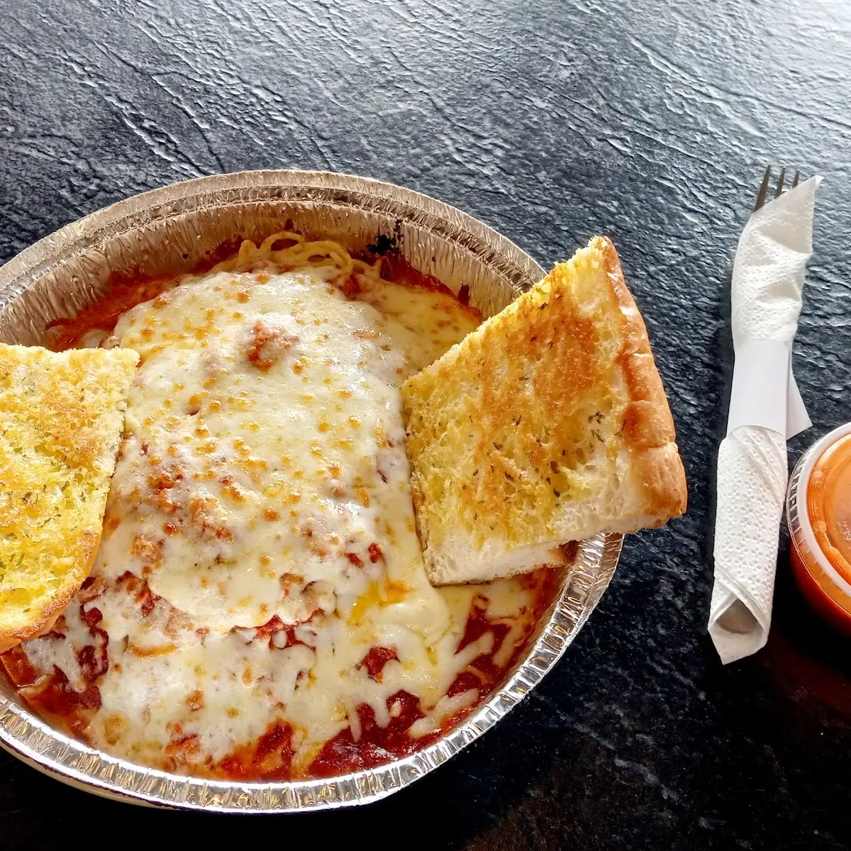 Baked Spaghetti with Garlic Bread