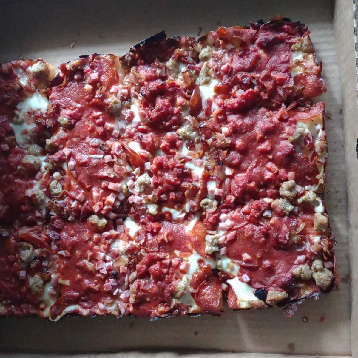 Meat Lovers Deep Dish Cheese Pizza