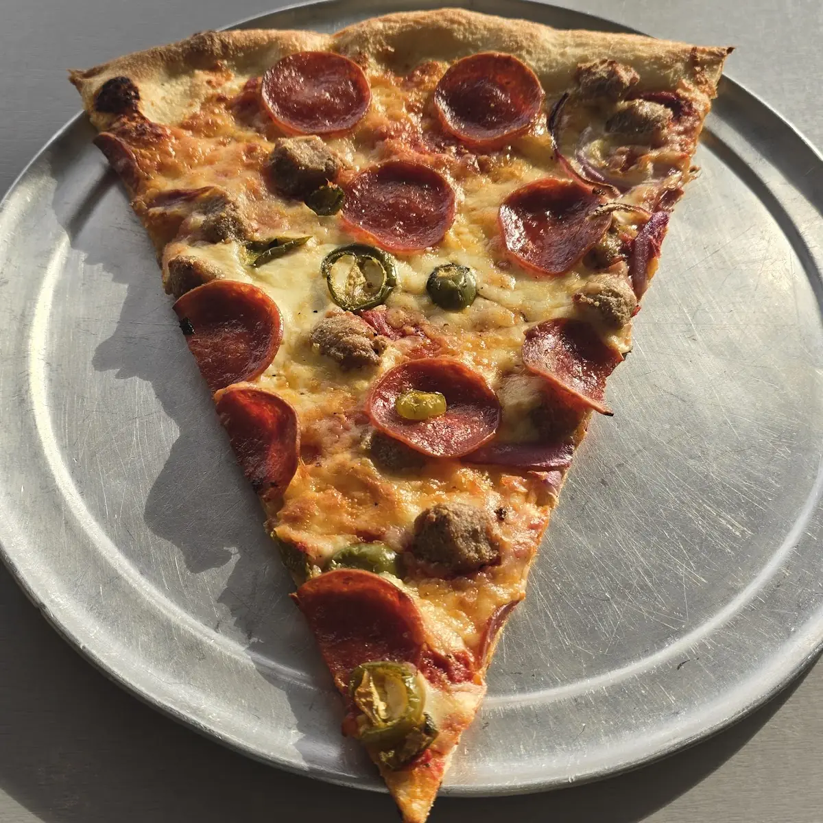 Two Giant Pizza Slices