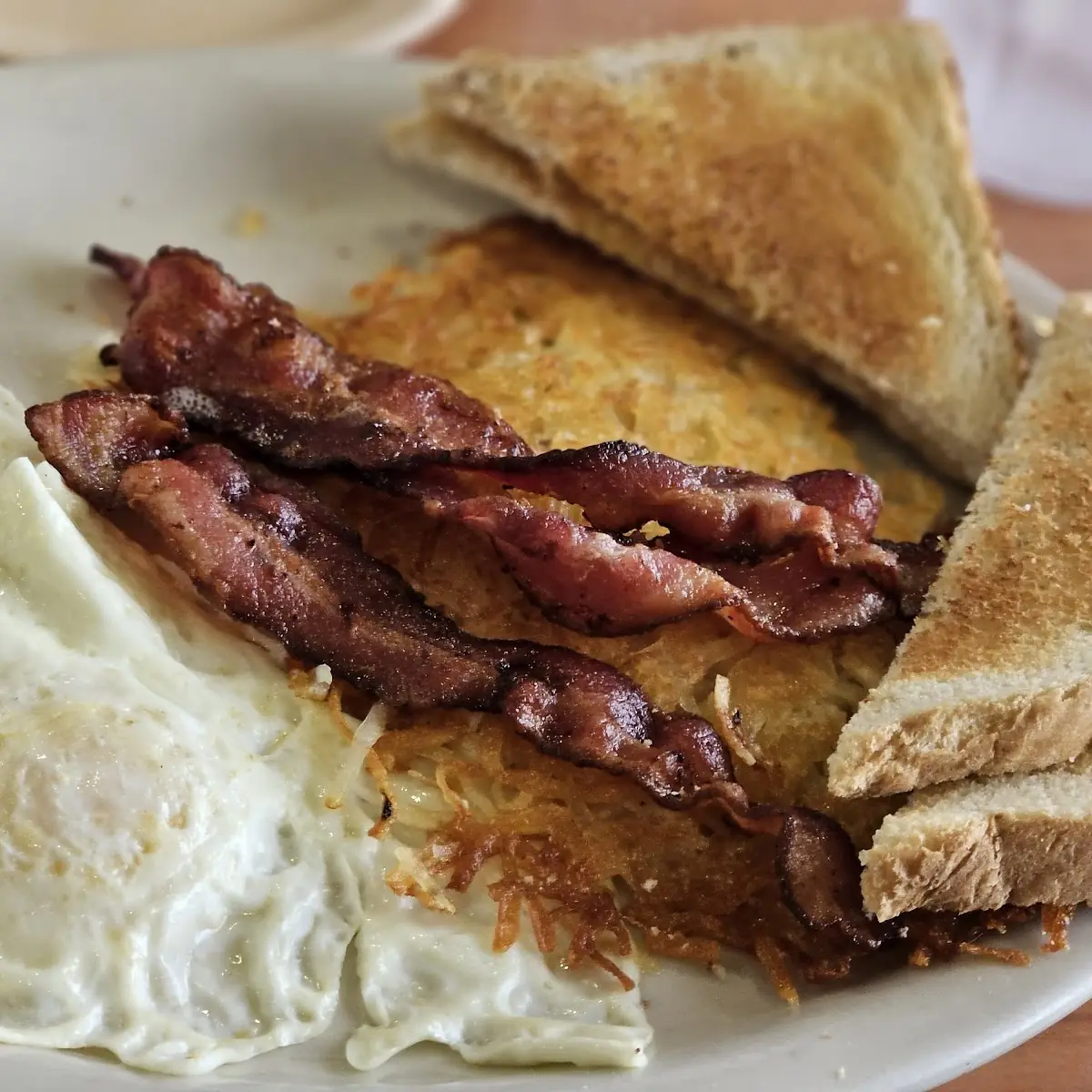Bacon and Eggs Hash Browns and Toast