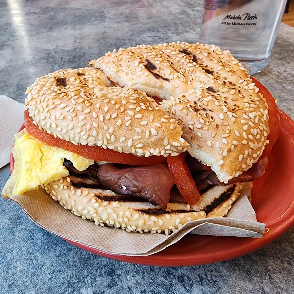 Pastrami Egg and Tomato Bagel