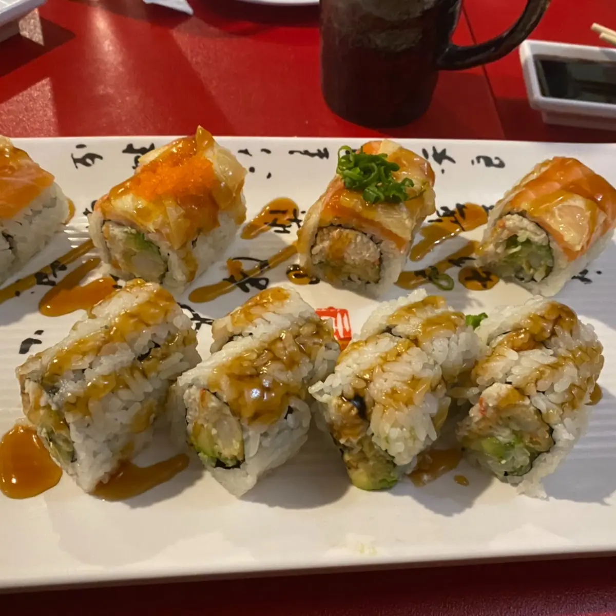 Dragon Roll California Roll Dynamite Roll and Red Bull