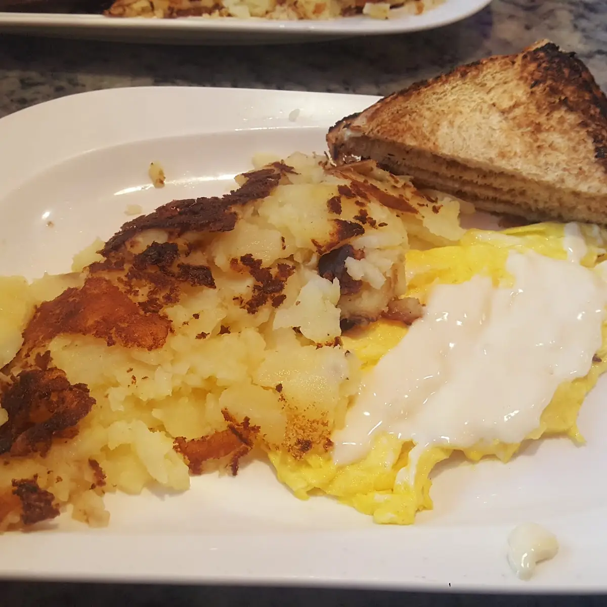 Eggs Home Fries and Toast
