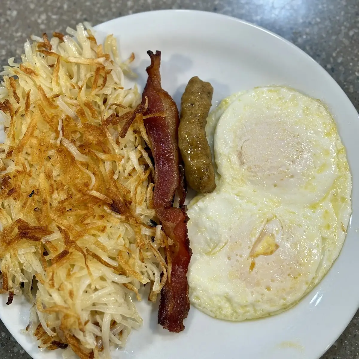 Eggs Hash Browns Sausage and Bacon