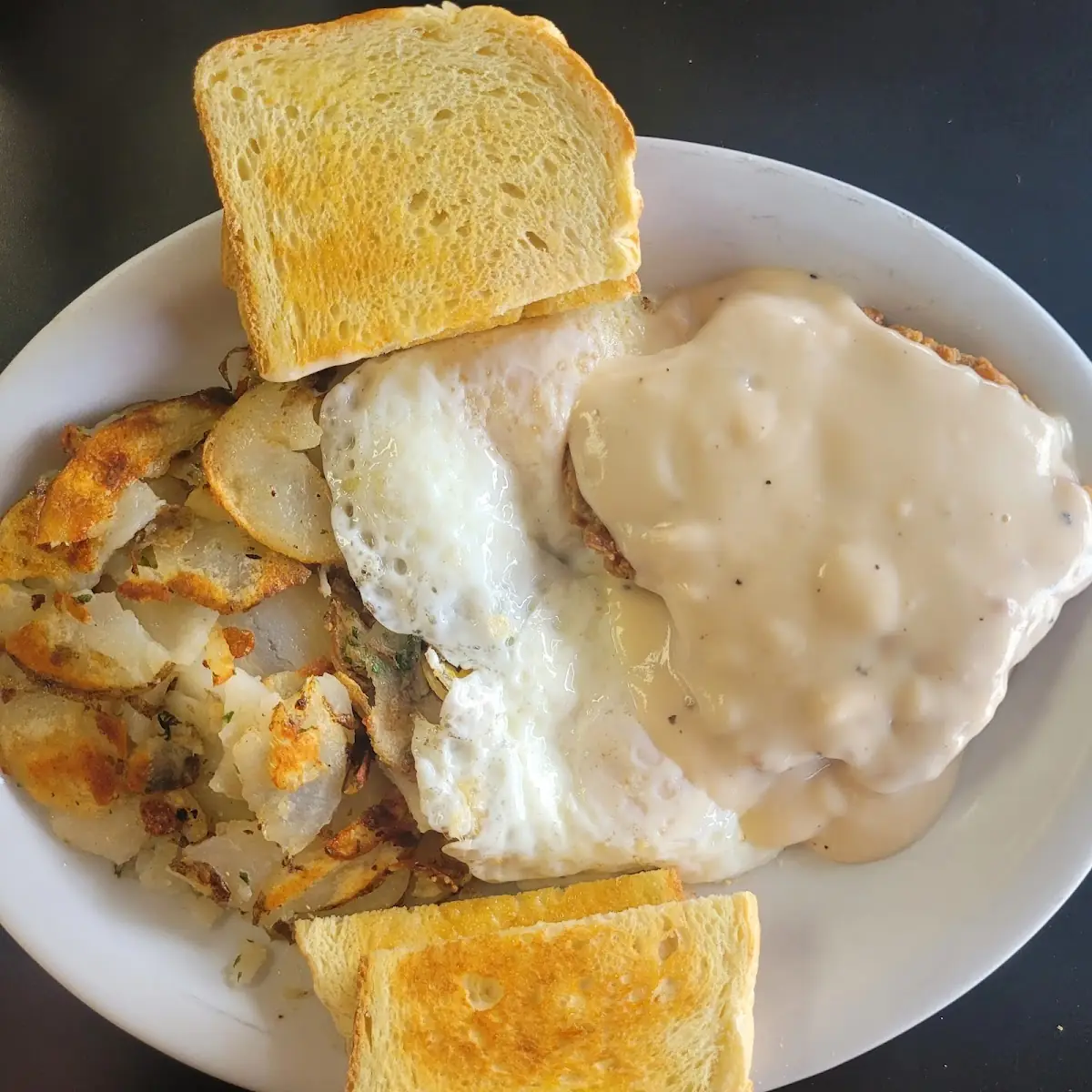 Chicken Fried Steak and Eggs and Toast
