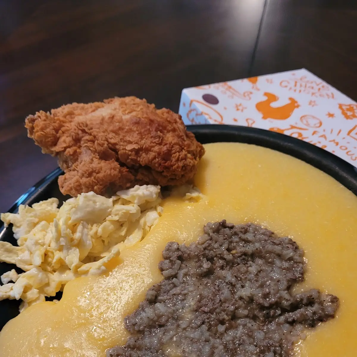 Popeye's Chicken Thigh Cheese Grits with Liver Pudding and Eggs