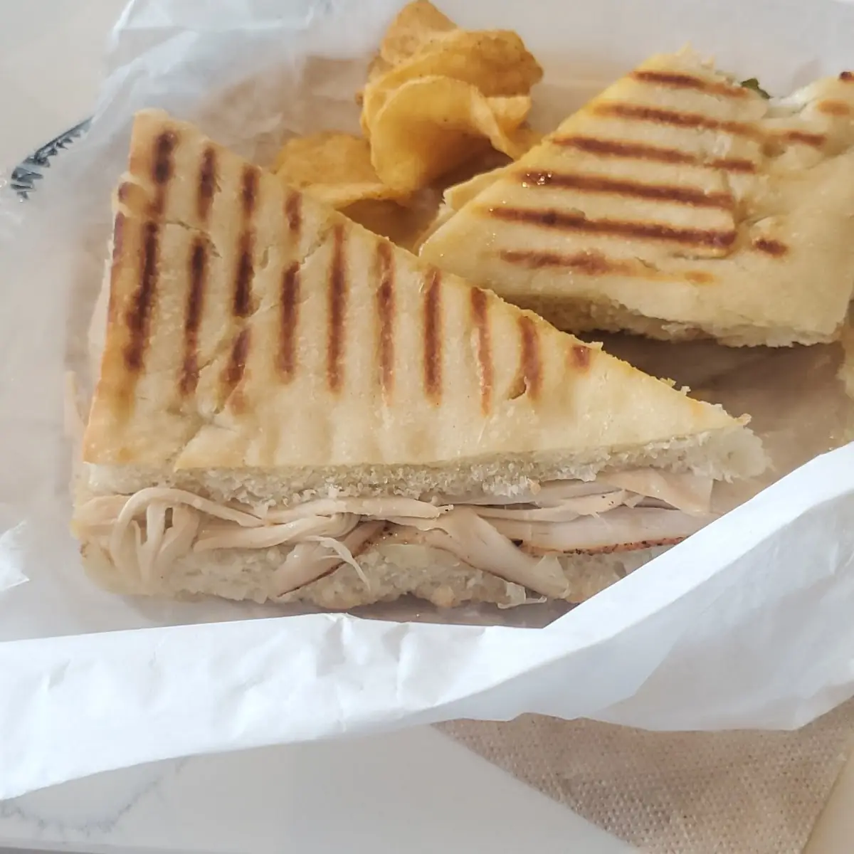 Hot Honey Turkey Club Panini