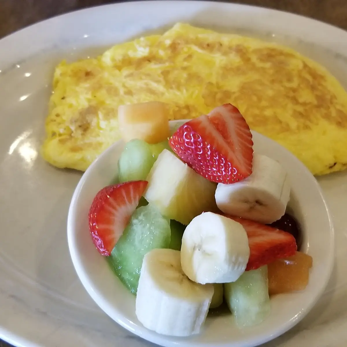 Cheese Omelette and Fruit Bowl