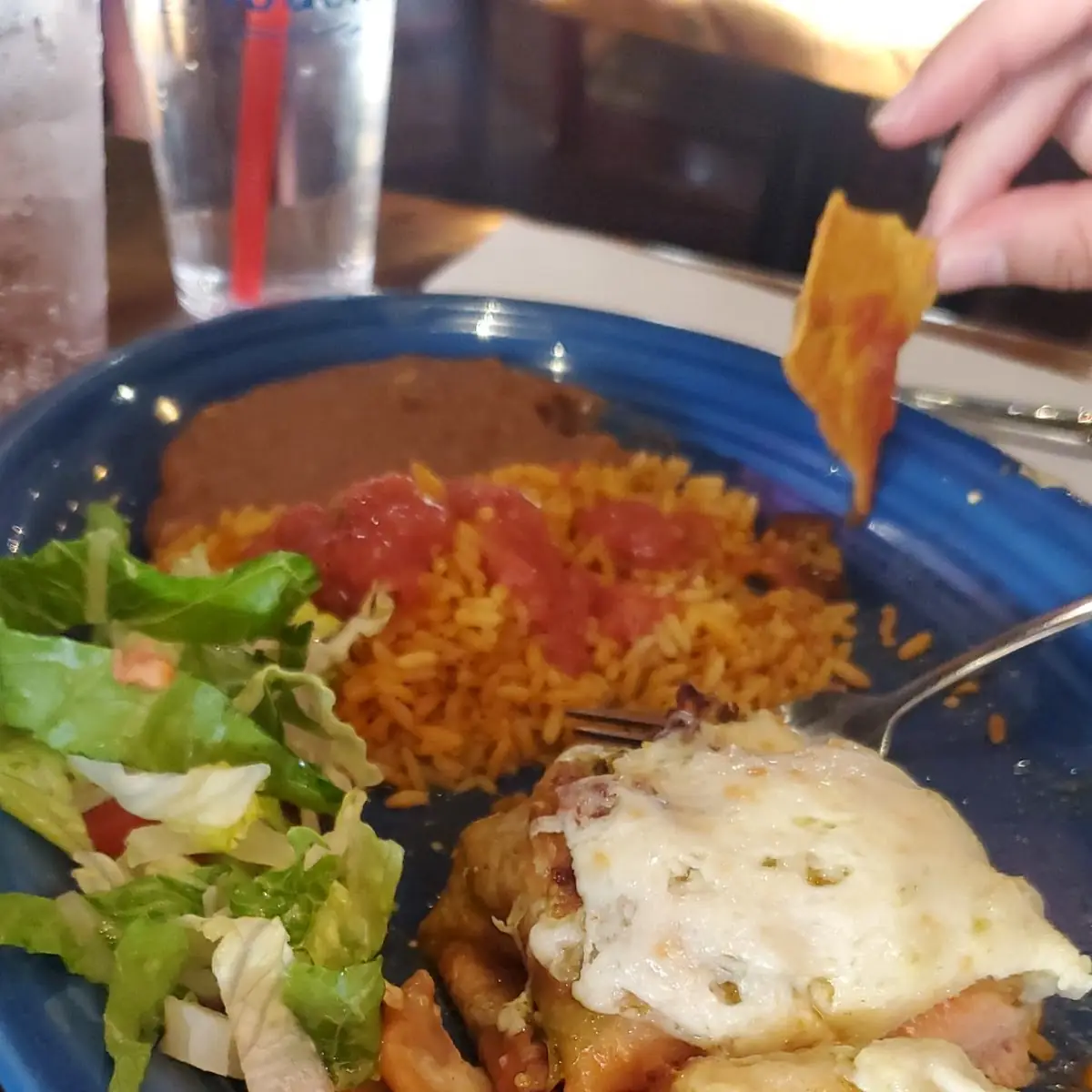 All Above Served with Mexican Rice & Refried Beans