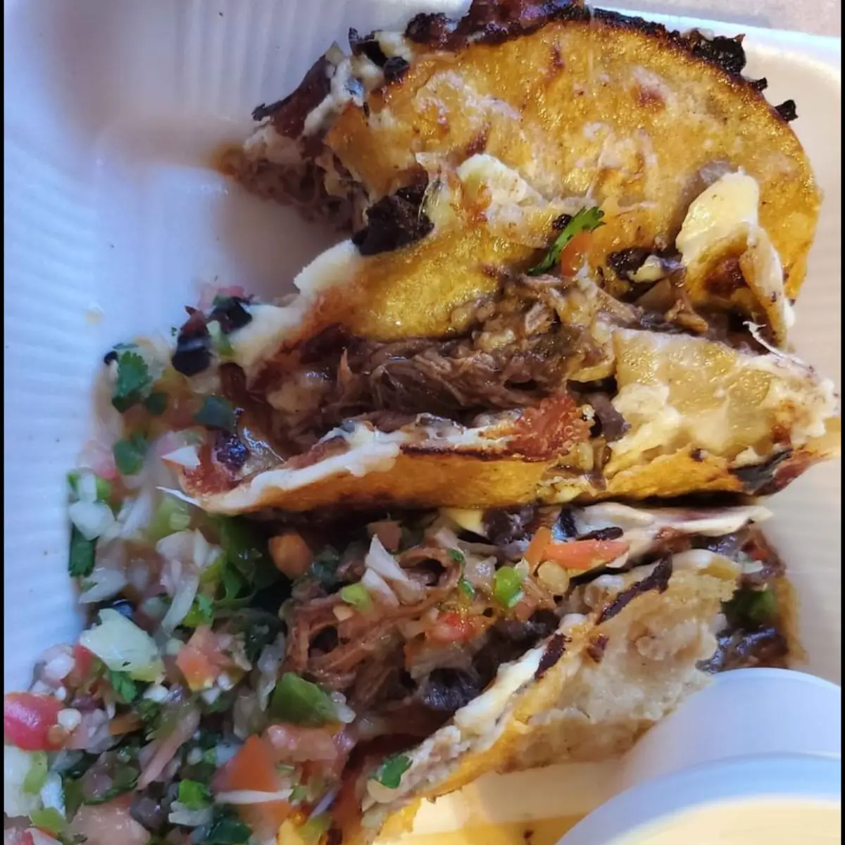 Cheesy Brisket Tacos