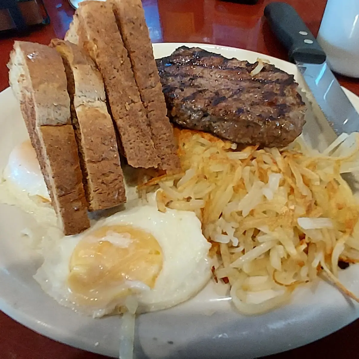 Flat Iron Steak Eggs Hash Browns Toast and Coffee