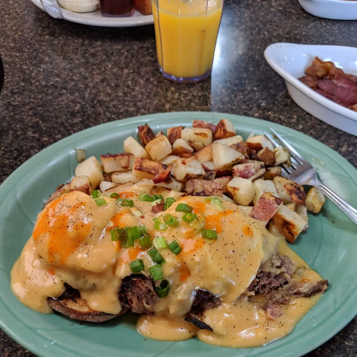 Pulled Pork Benedict with Sriracha Hollandaise
