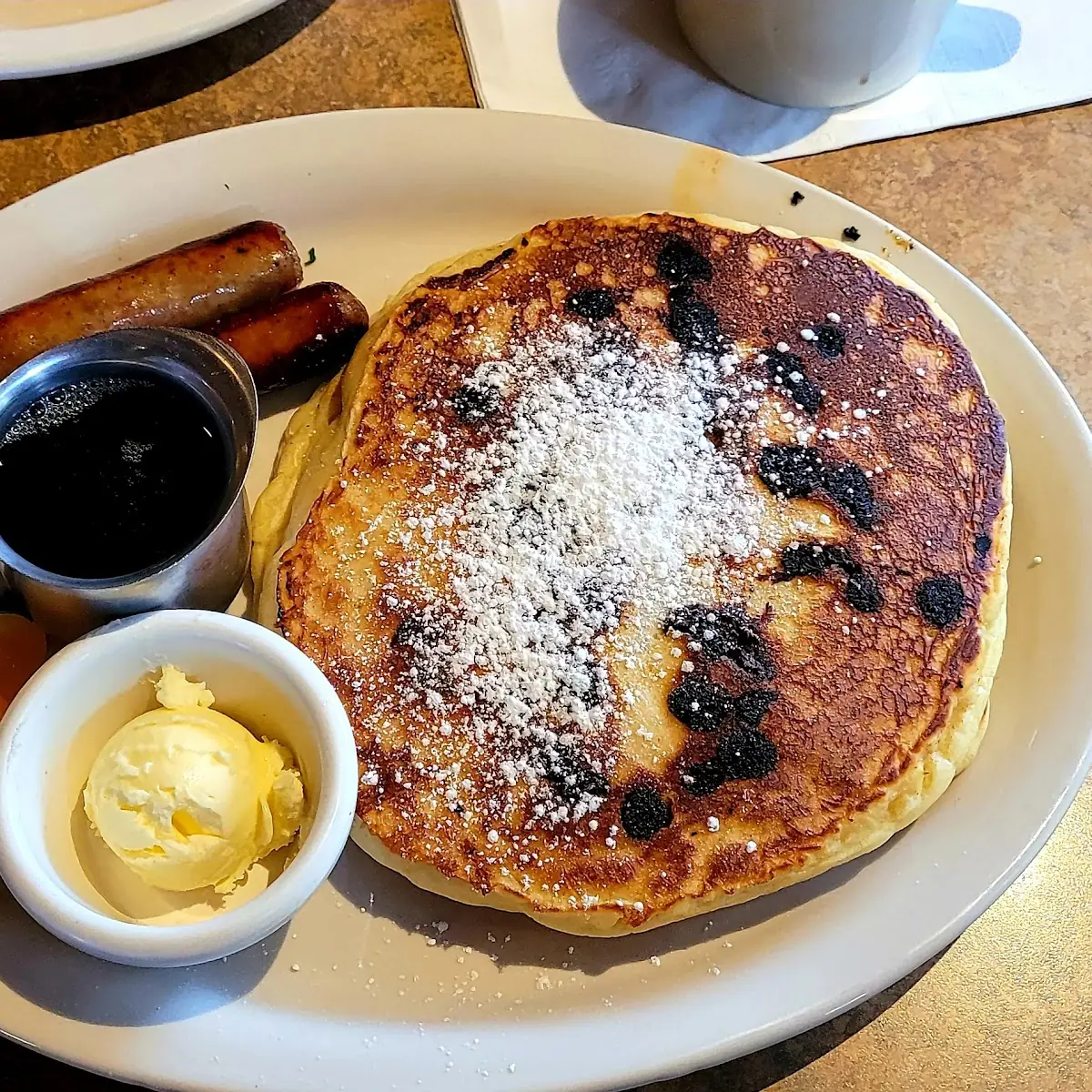 Chocolate Chip Pancakes Hash Browns and Sausage