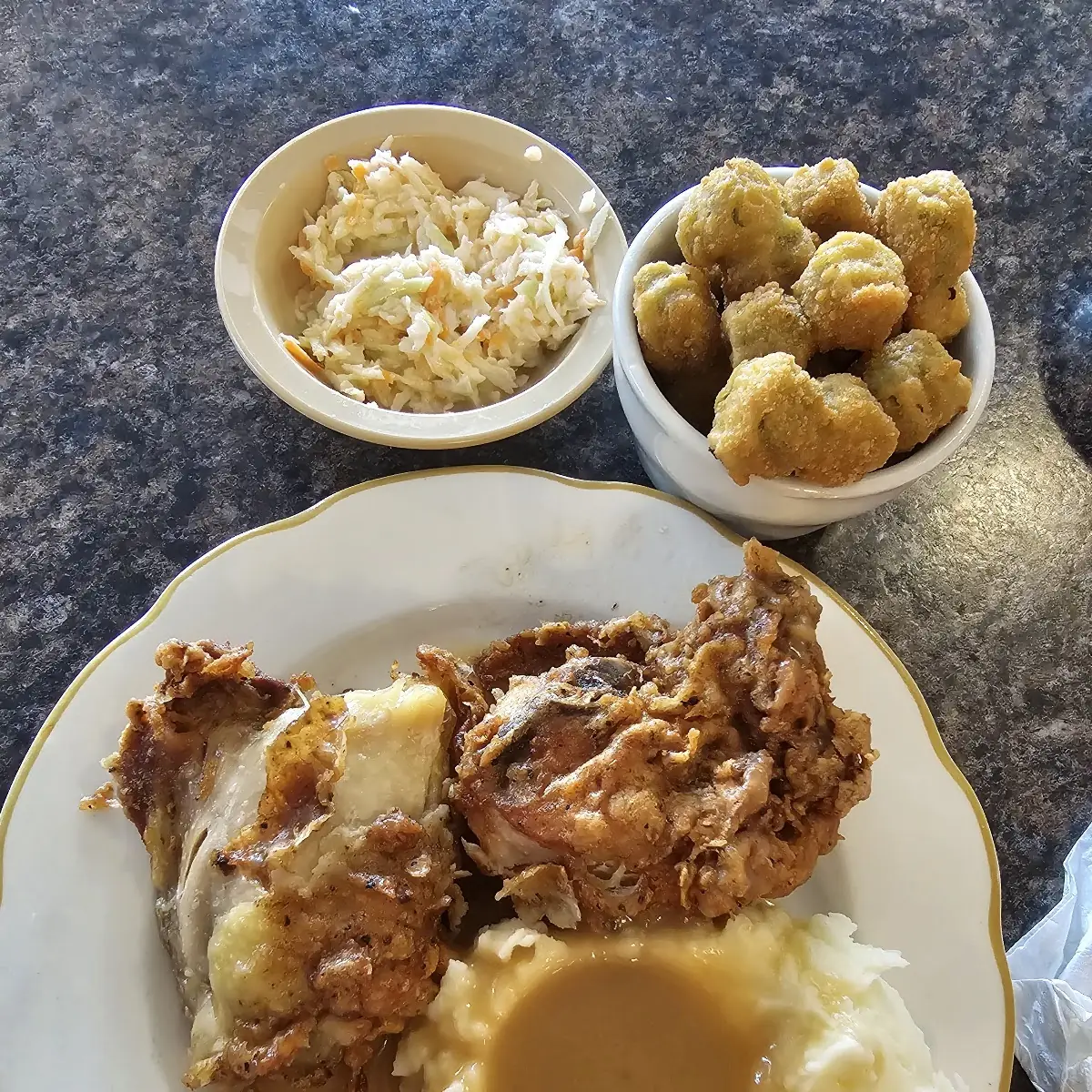 Fried Chicken Dinner Thigh and Breast with Mashed Potatoes and Brown Gravy Fried Okra and Coleslaw
