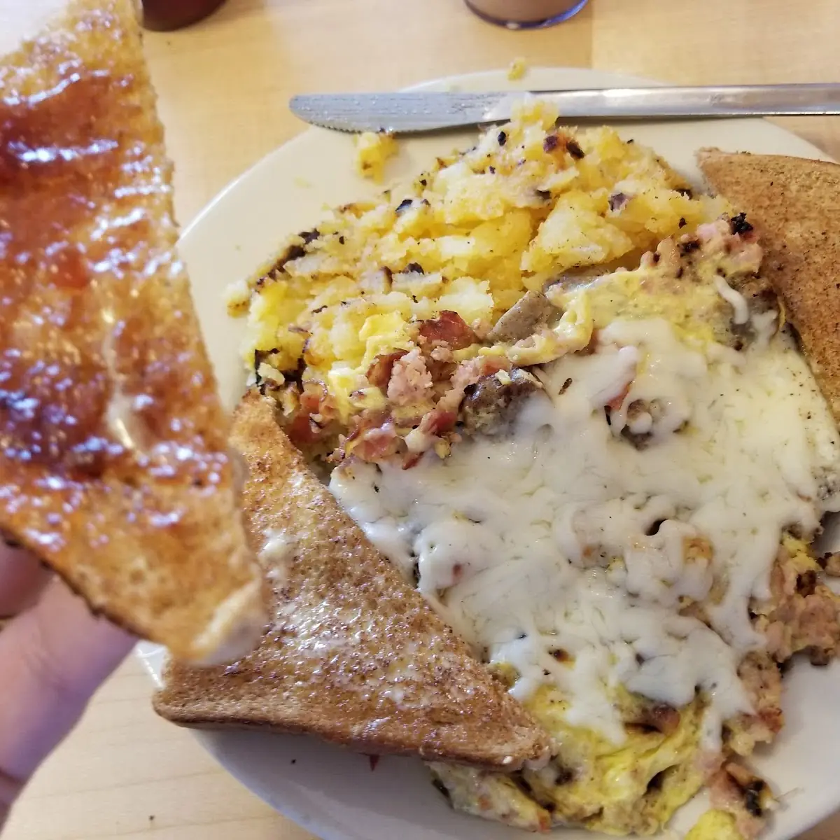 2 Scrambled Eggs Home Fries and Wheat Toast