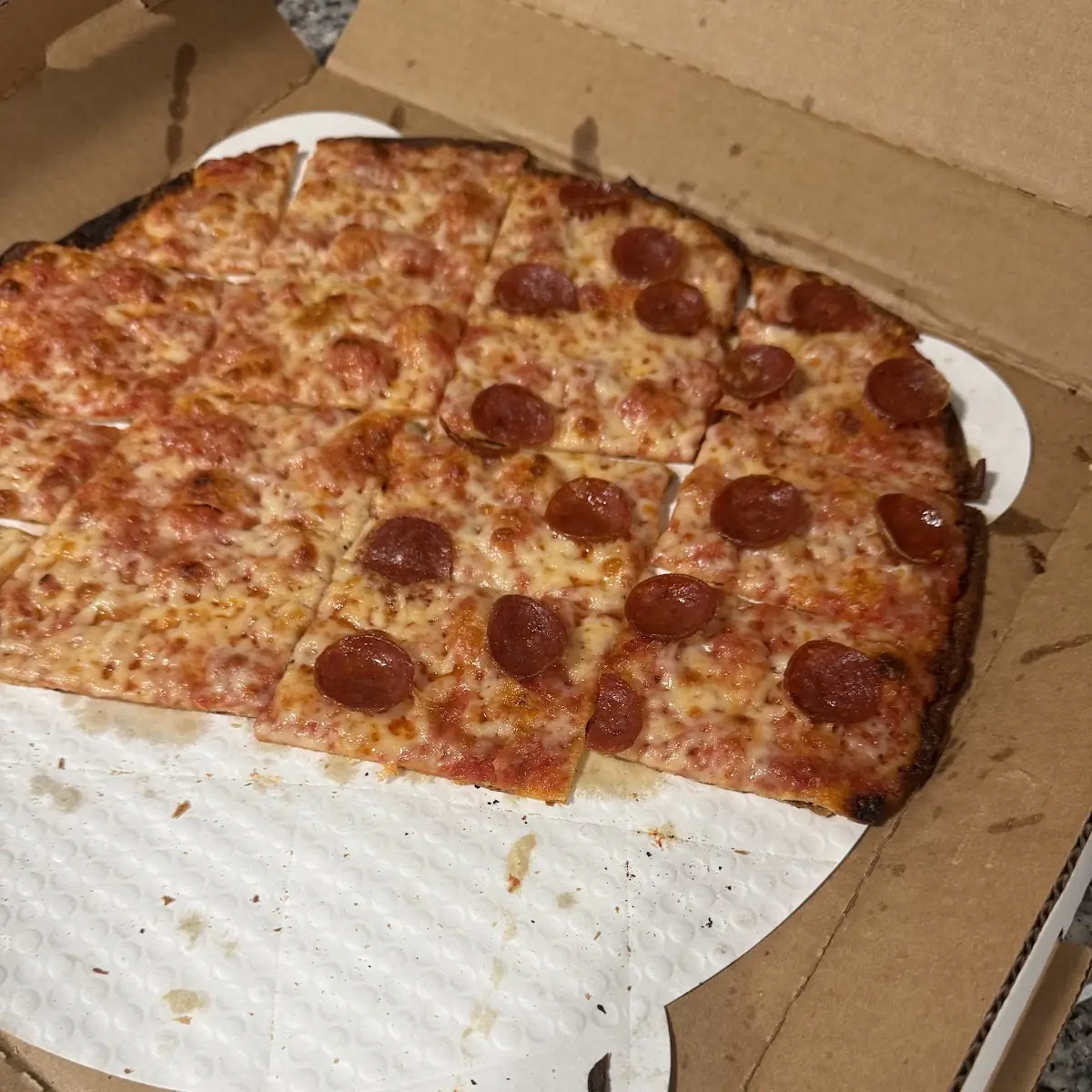 Pepperoni and Supreme Deep Dish Pizzas