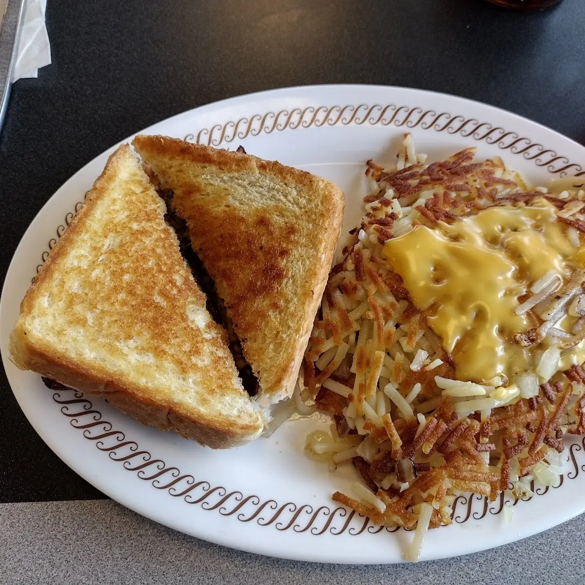 2 Egg Breakfast with Hash Browns and Bacon Strips