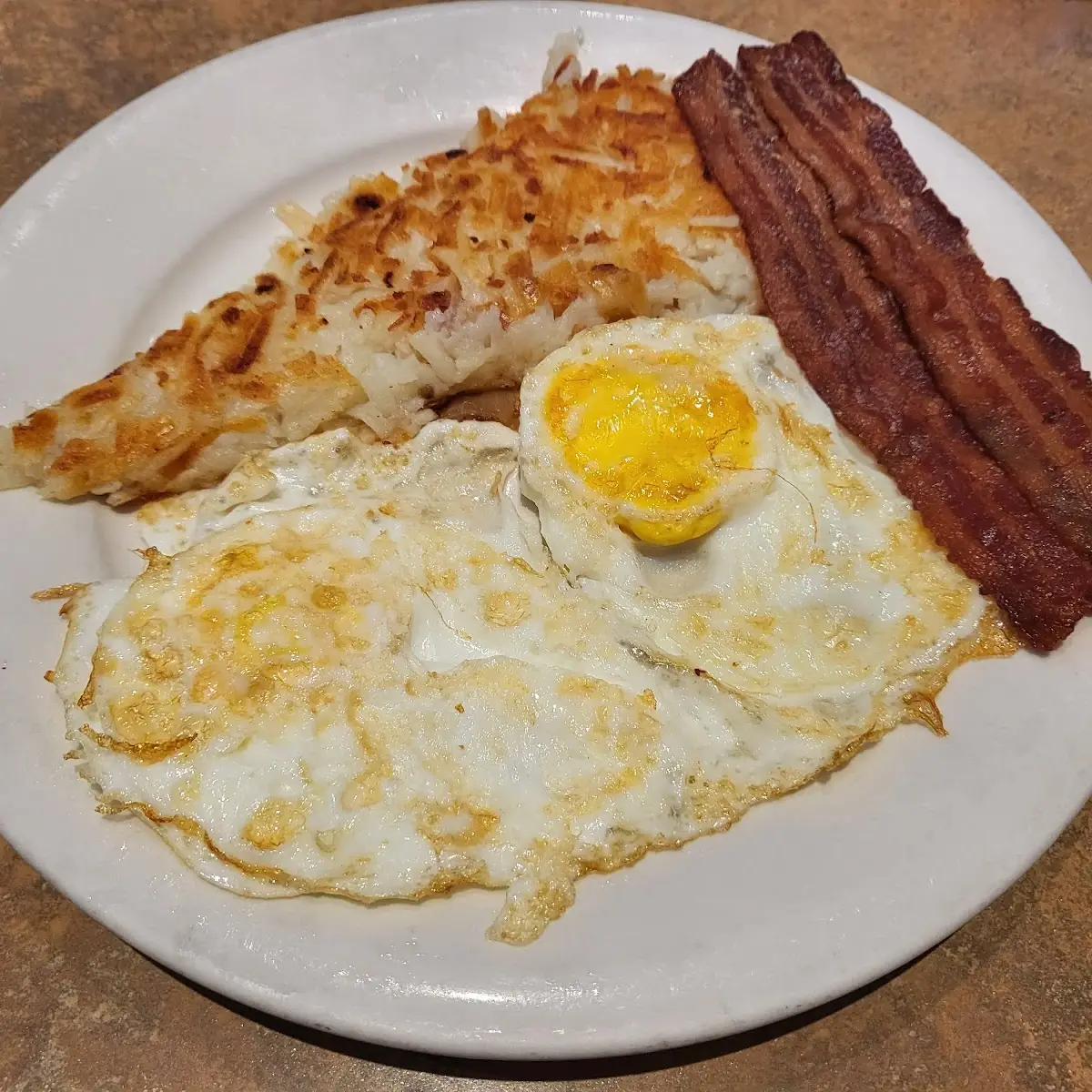 Eggs over Easy with Hash Browns and Bacon