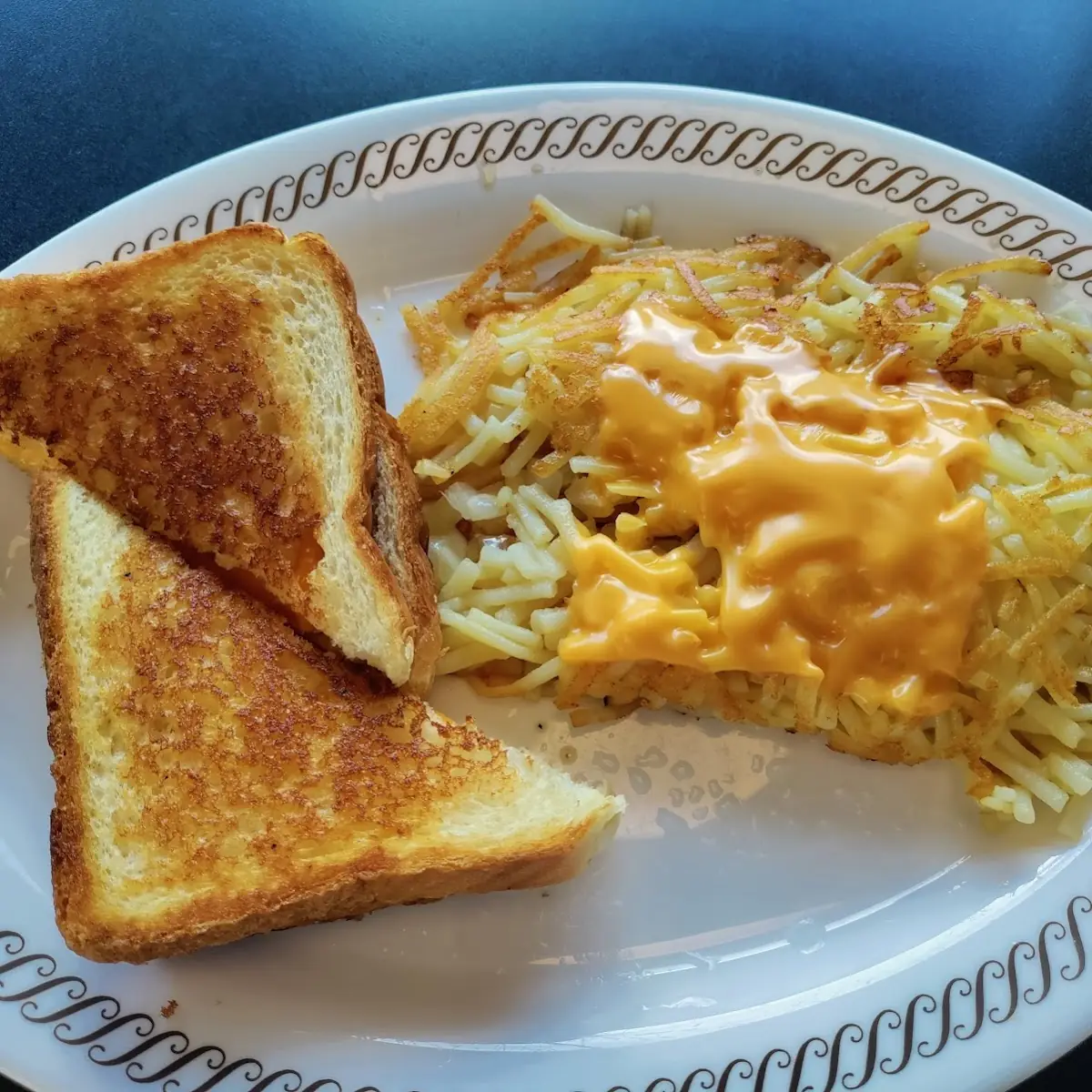 Grilled Cheese and Hash Browns with Onions and Cheese