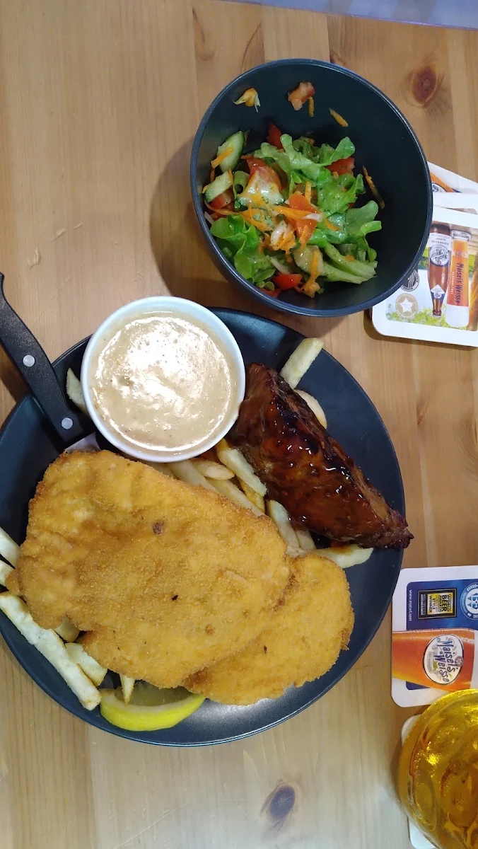 Schnitzel and Rib Combination Plate with Pepper Source Chips and Salad