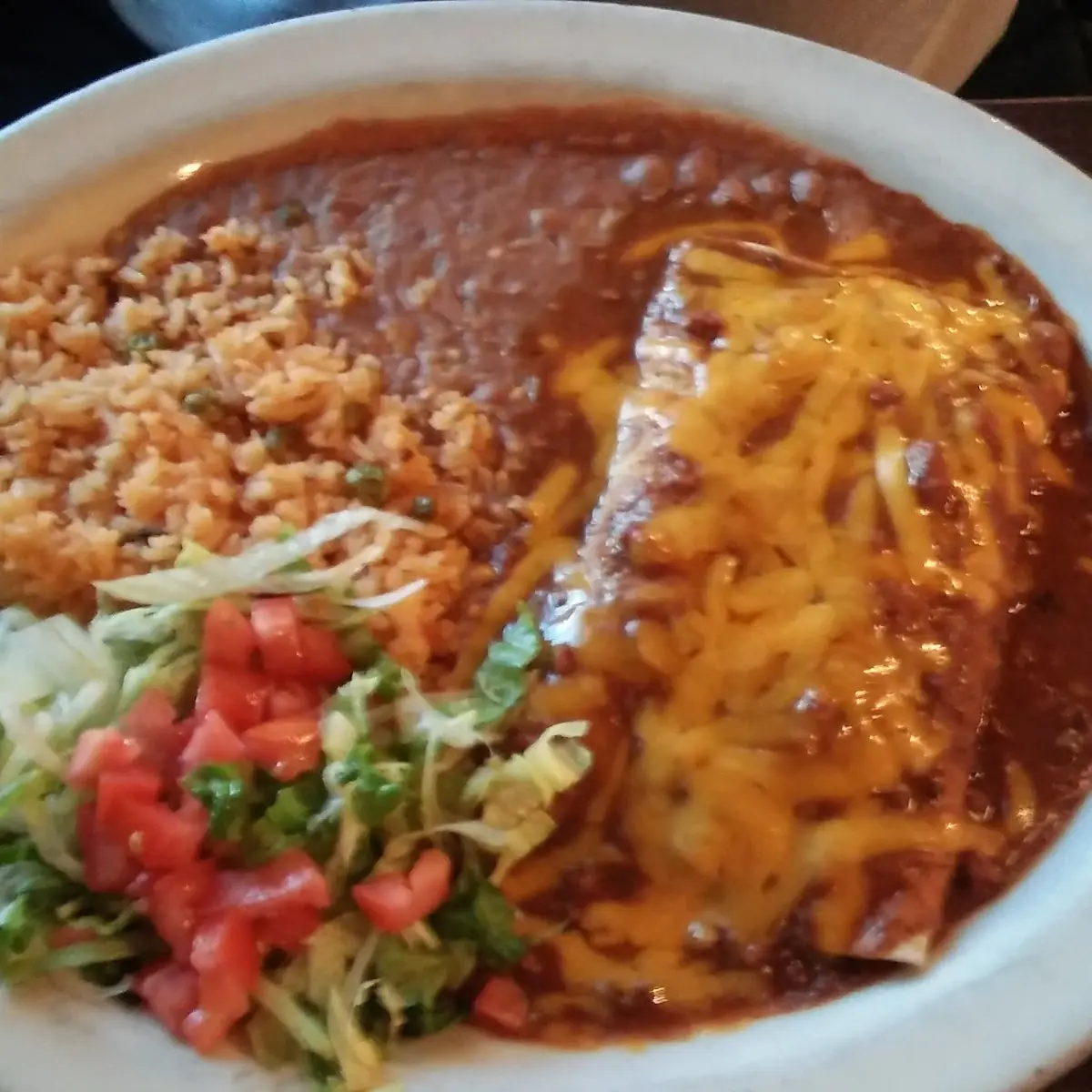 Beef Enchiladas Dinner with Rice Refried Beans and Guacamole Dip
