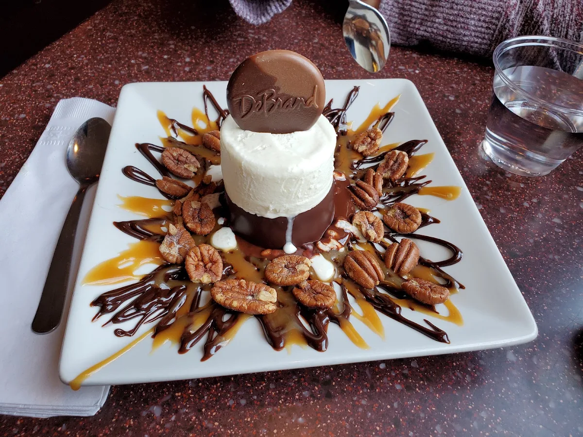 Sundae with Raspberry and Caramel Topping and Pecans