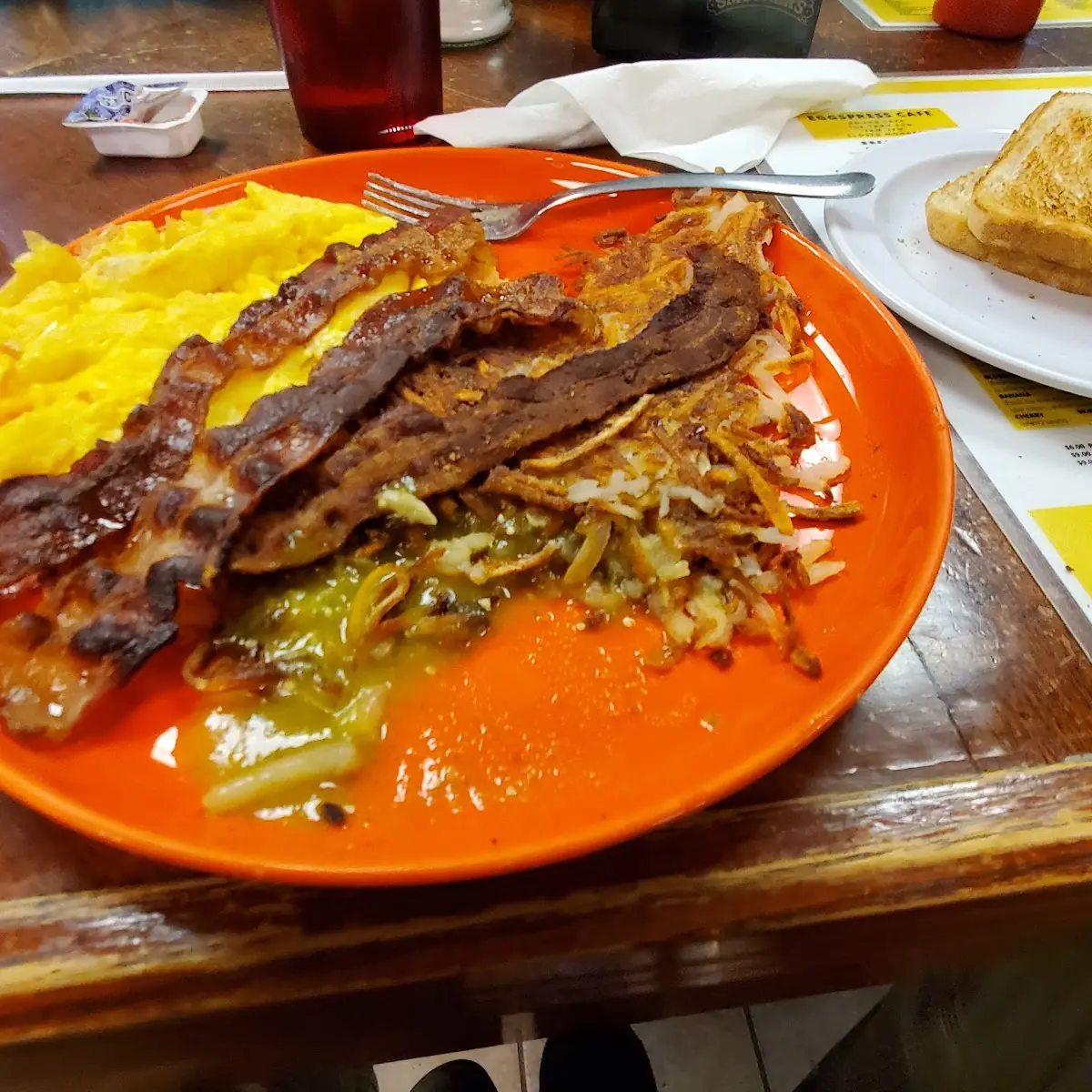 Scrambled Eggs Hashbrowns Bacon with Green Sauce