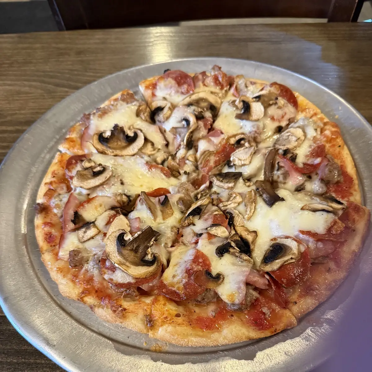 Small Meat Pizza Added Mushrooms