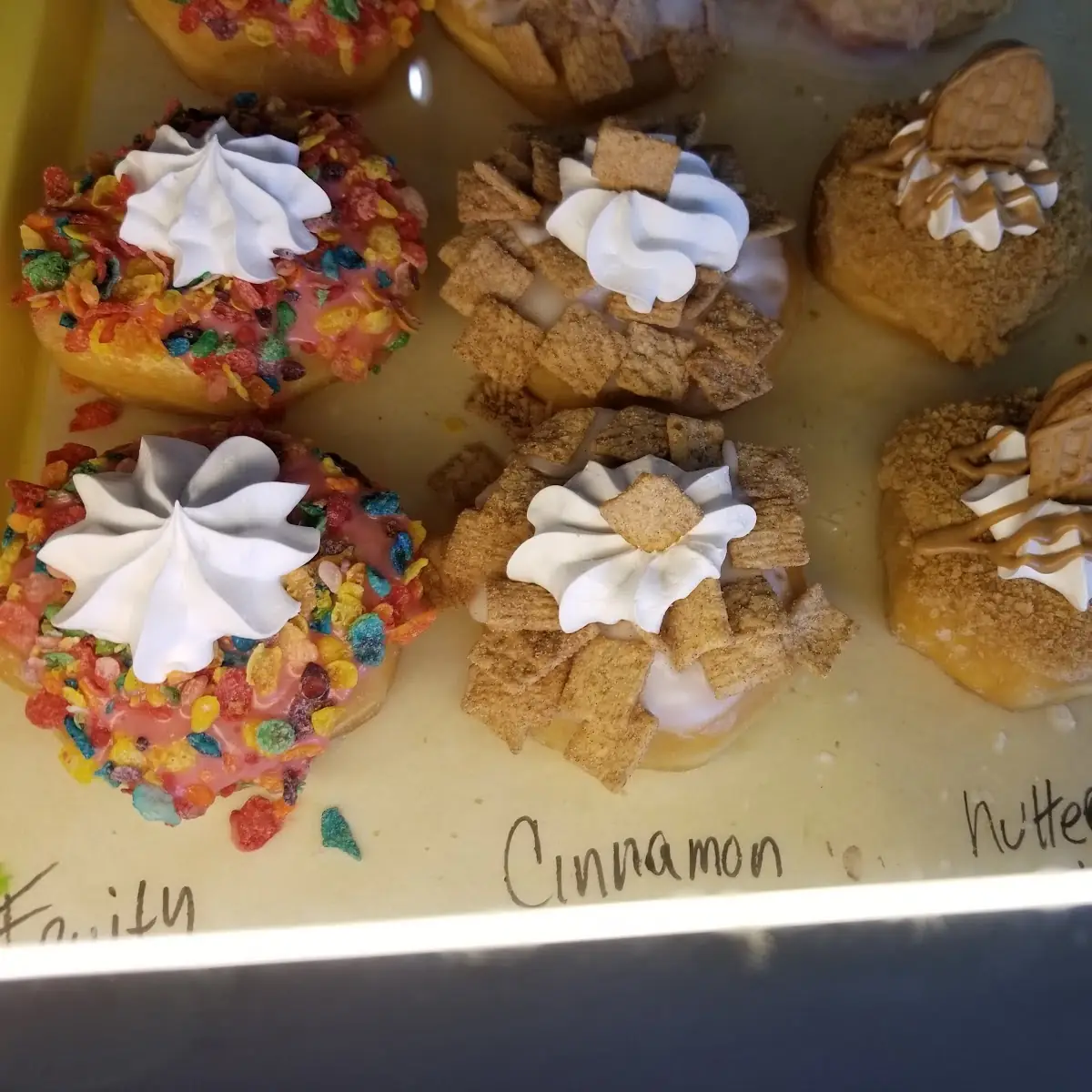 Fruity Pebble Cinnamon Toast Crunch Nutterbuddy and Chocolate Chip Cookie Donuts
