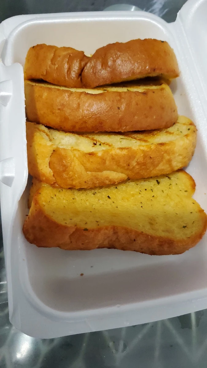 Chargrilled Quarter Leg + 1 Reg side + 1 Garlic Bread