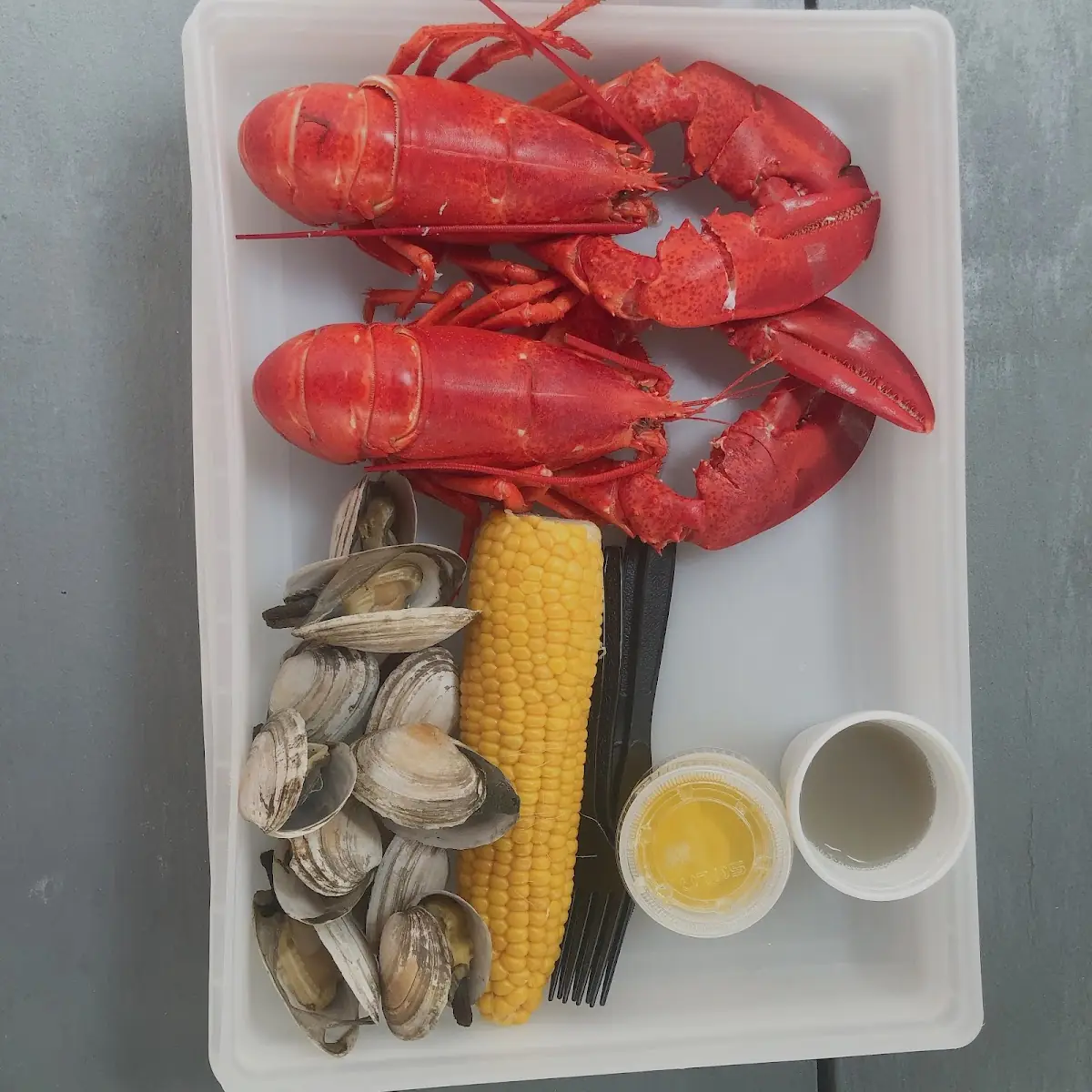 Whole Cooked Lobster and Lobster Bisque