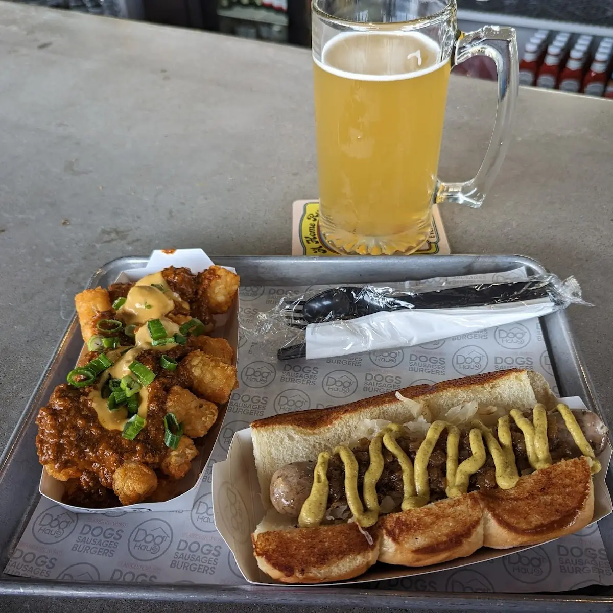Bratwurst Chili Cheese Tots Mango Wheat Beer