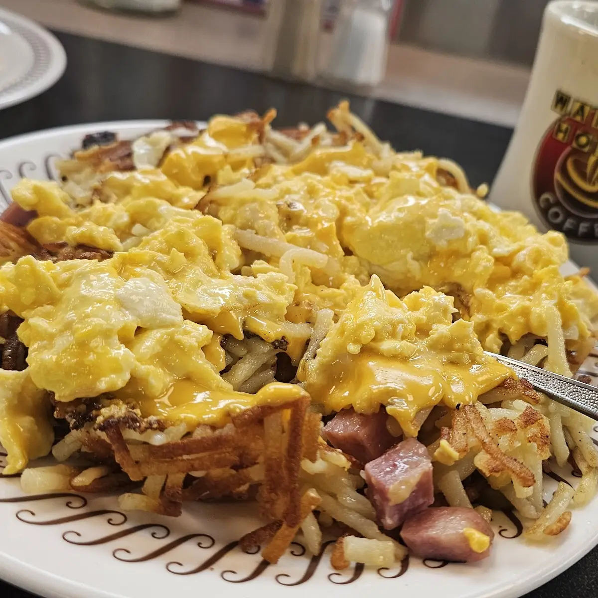 Scrambled Eggs Hash Browns Scattered Smothered Chunked and Covered
