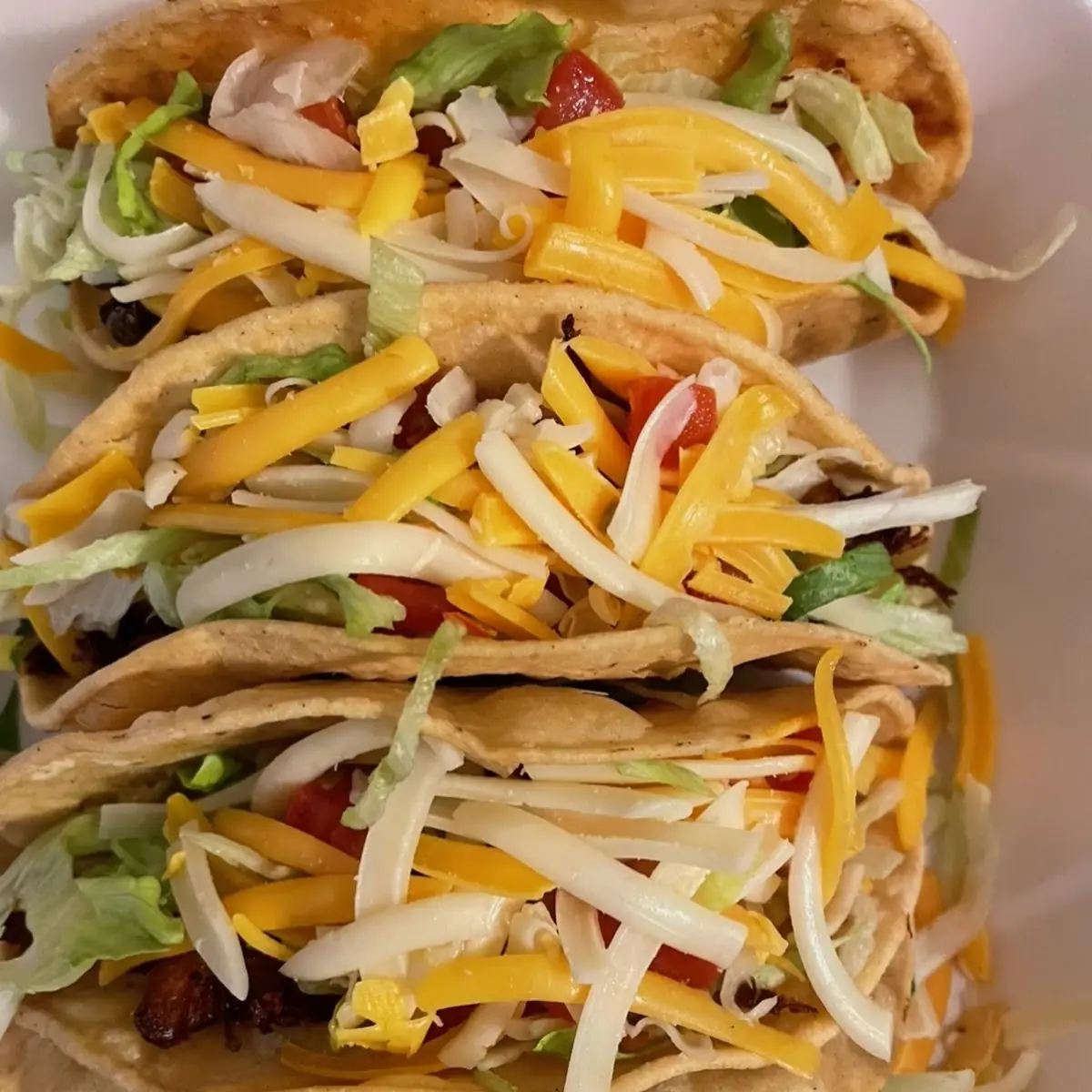 One Chicken Taco 1 Chicken Enchilada