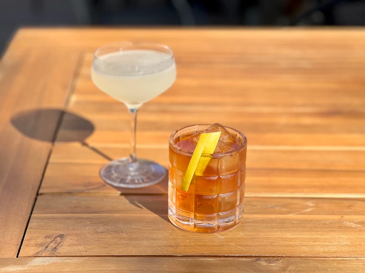 Whiskey Cocktail with Orange Peel Garnish