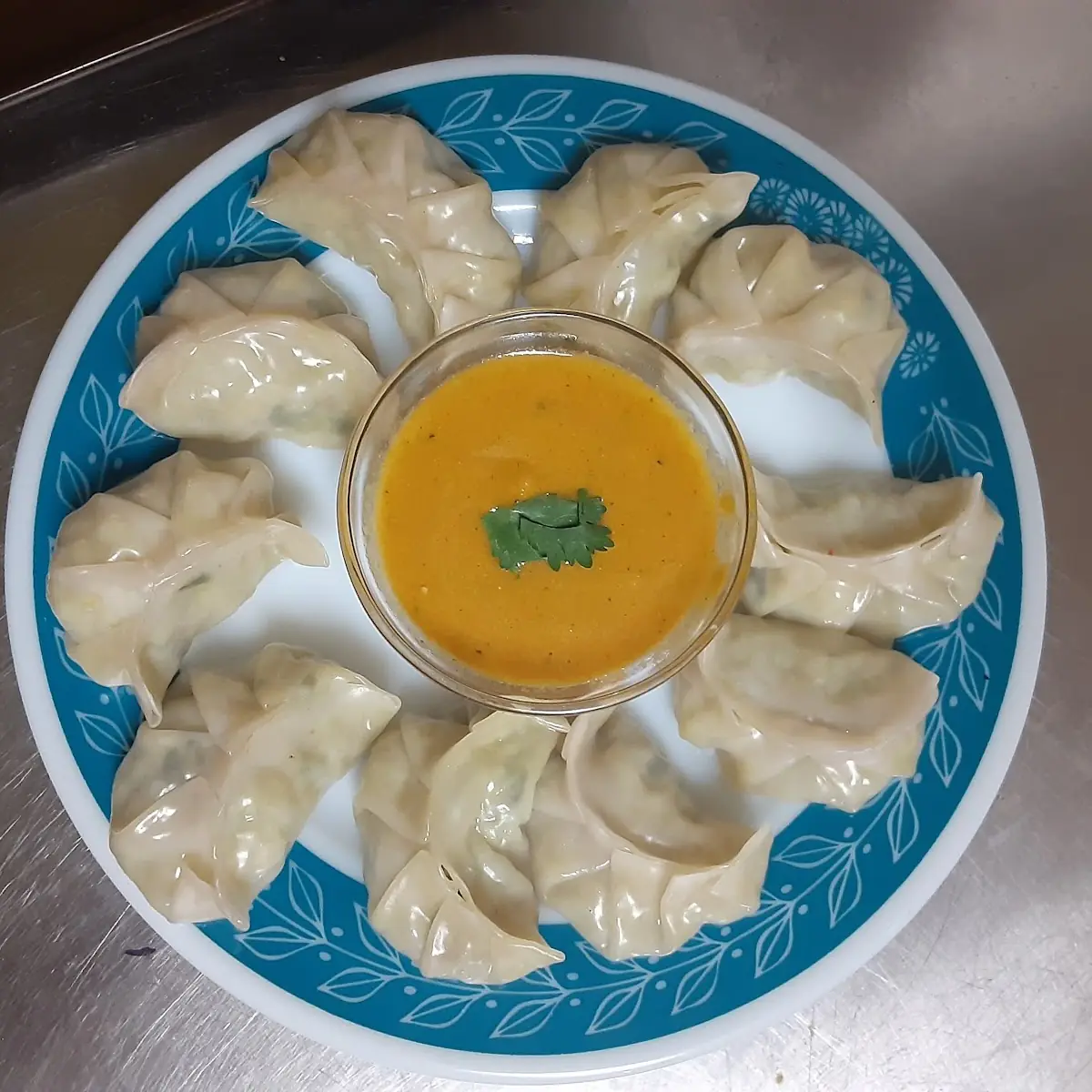 Steamed Momos with Dipping Sauce