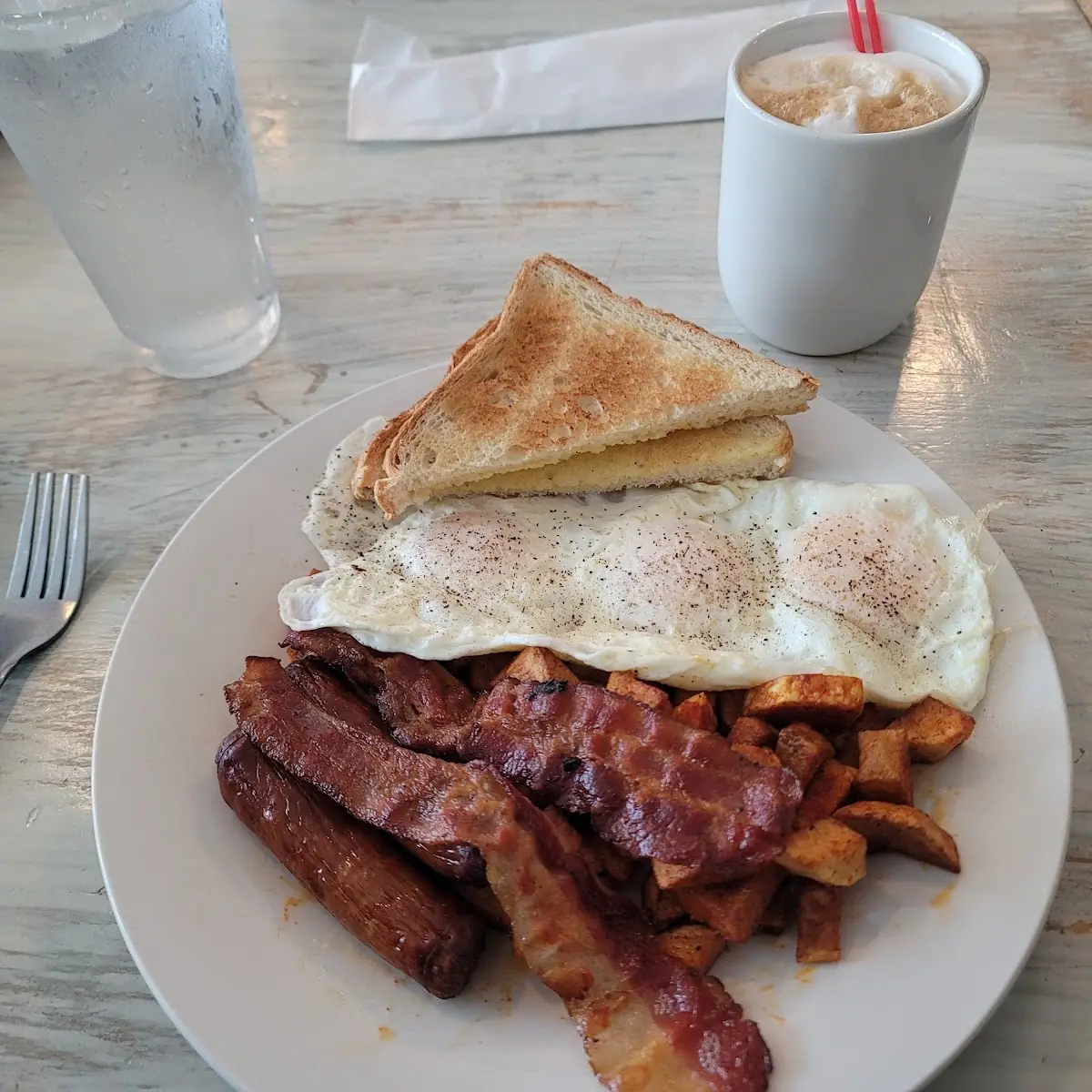 Two Eggs over Easy with Sausage and Hash Browns