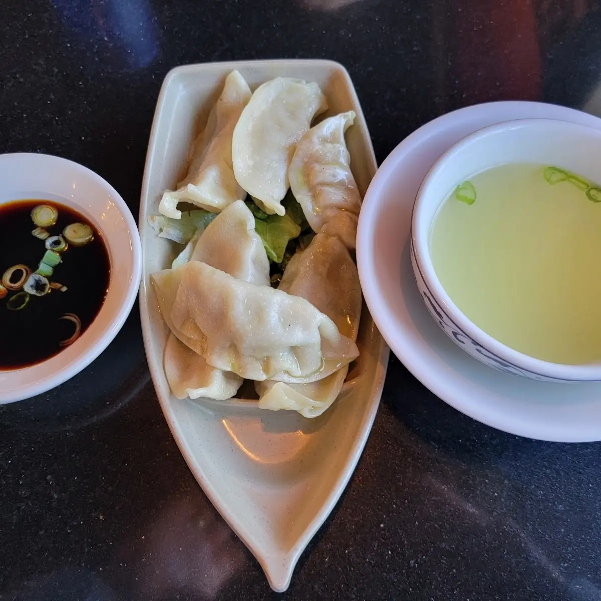 Steamed Dumplings with Onion Soup