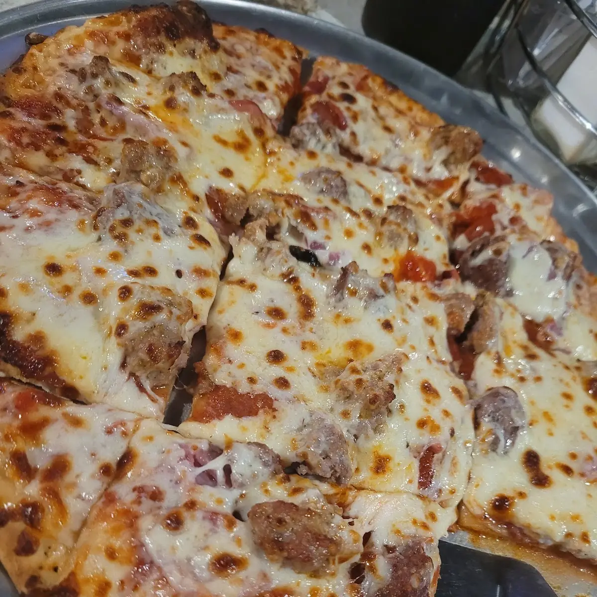 Thin Crust Sausage and Pepperoni Pizza