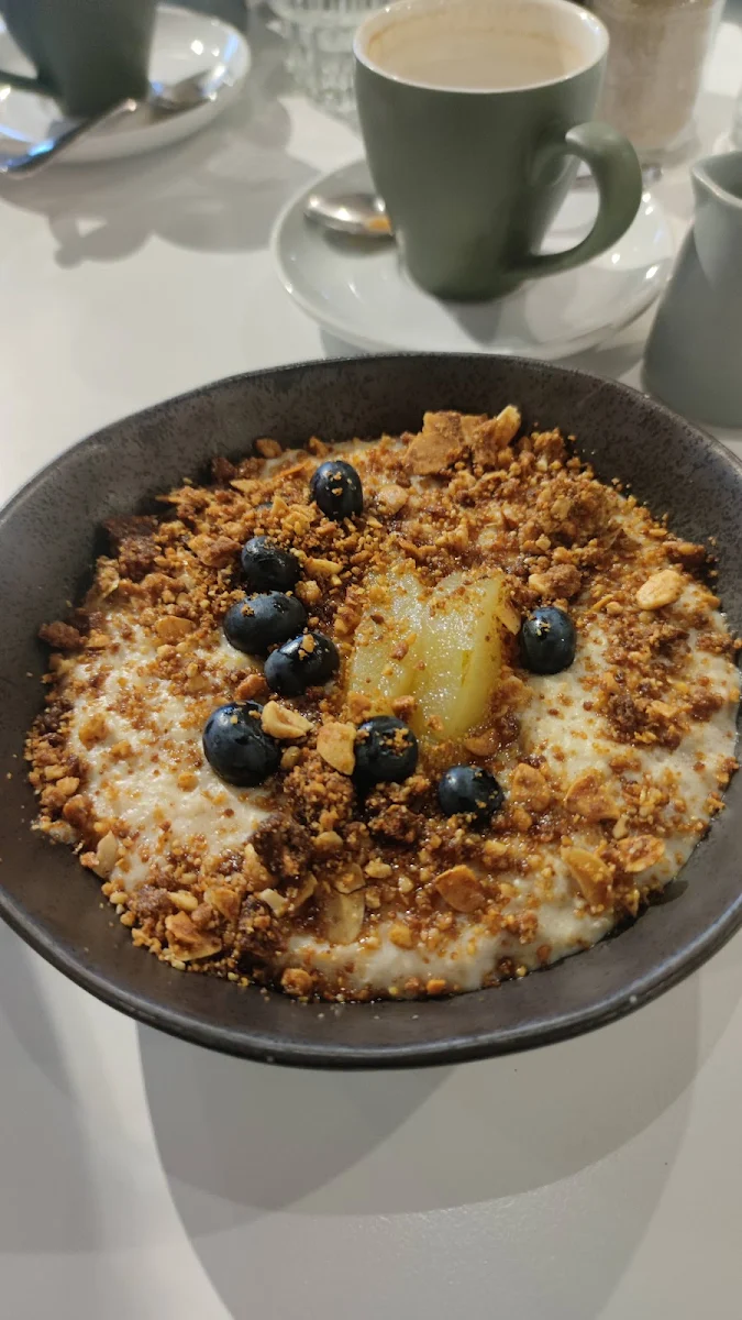 Vanilla Scented Porridge Poached Fruit Candied Seeds Yoghurt, The Hamptons Bakery