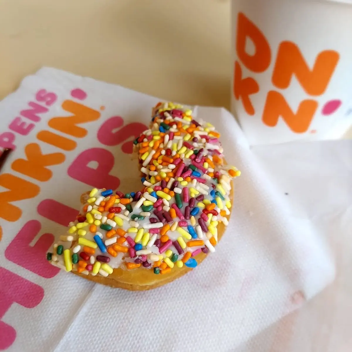 Vanilla Frosted Donut with Rainbow Sprinkles
