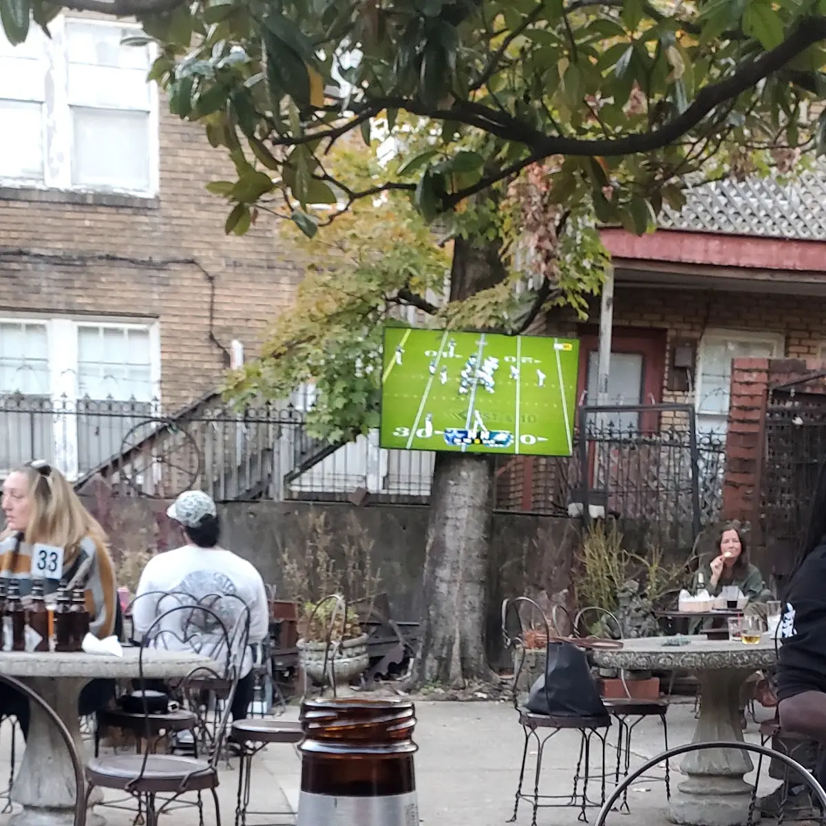 Watching the Game on Big Screen on Patio