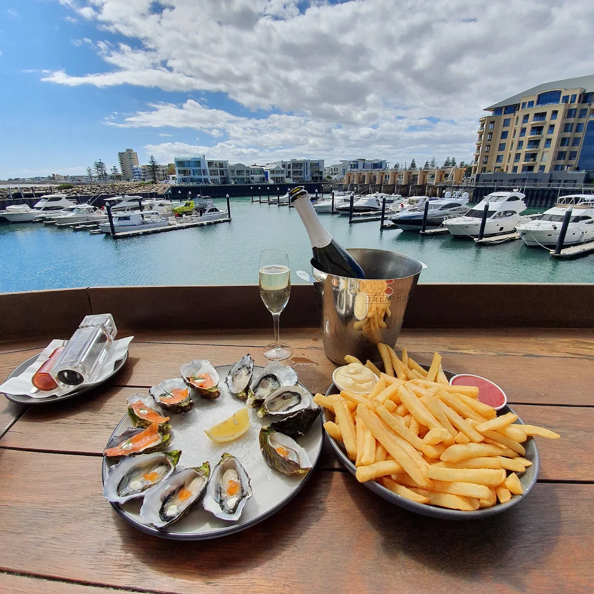Mix of Natural Oyster Caviar and Atlantic Bowl of Chips Bottle of Vedova, Oyster Bar Holdfast Shores