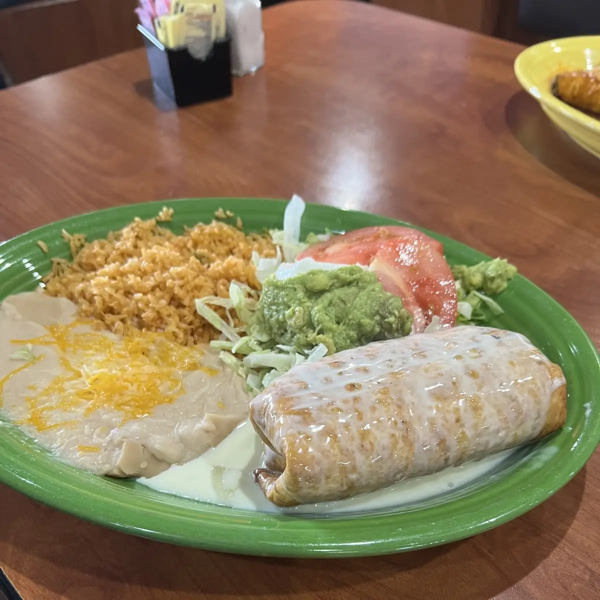 7 Beef Burrito with Red Sauce Refried Beans and a Beef Tacos