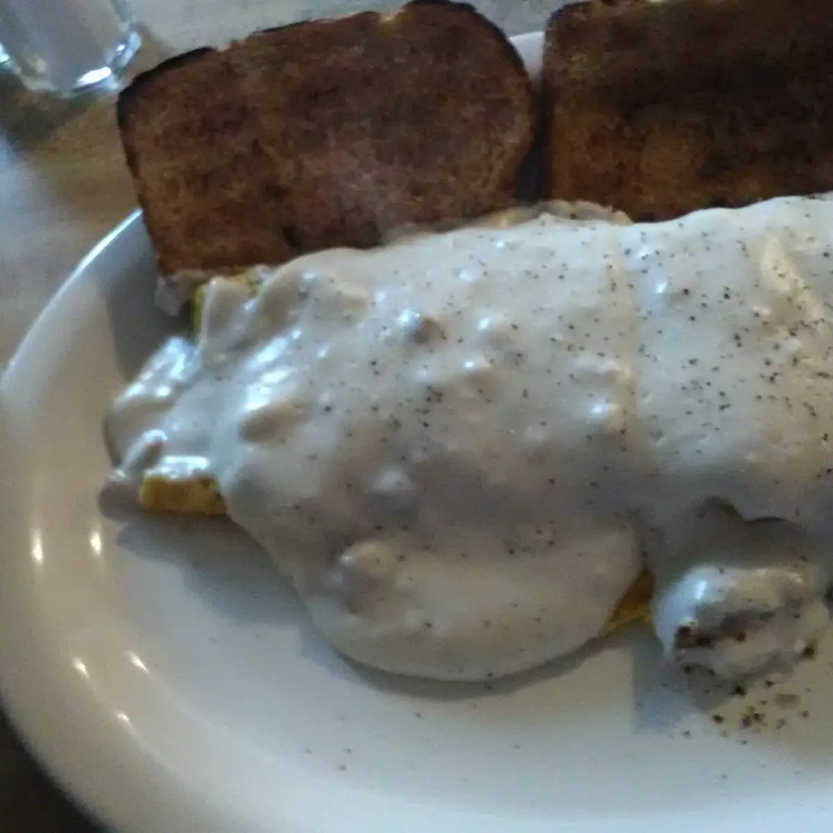 Egg Cheese and Bacon Omelet with Gravy and Toast