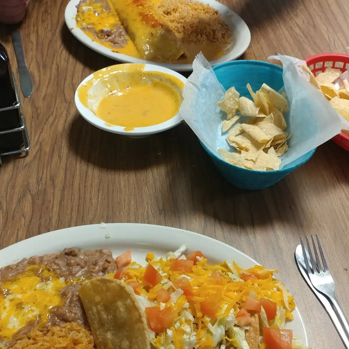 Three Tacos with Refried Beans and Rice