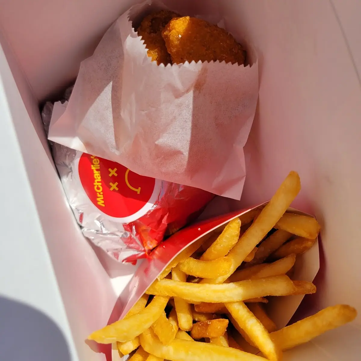 Frowny Meal Includes Plant Based Burger Chik'n Nuggets French Fries and Coke
